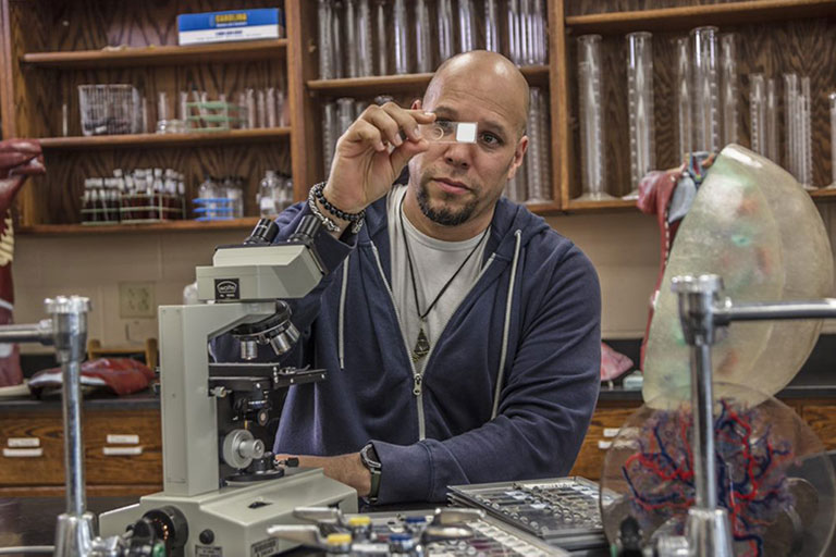 Student with Microscope