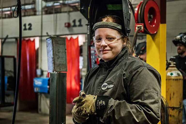 Female Welding Student