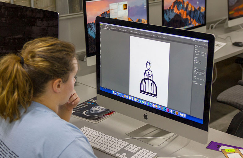 Student drawing using a computer software. 