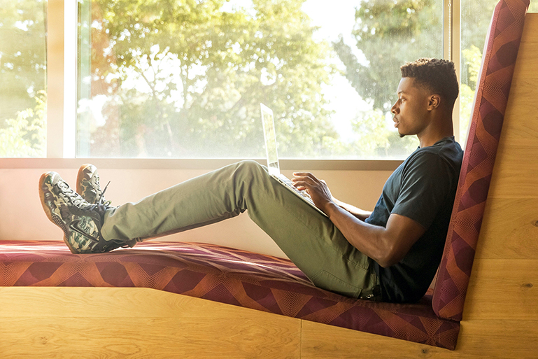 Guy Lounging On Couch